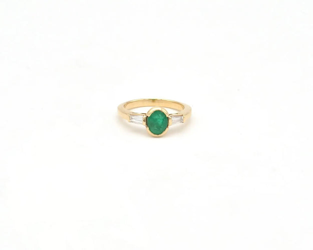 Bague Bague en or jaune avec émeraude de 0,60 ct et diamants coniques 58 Facettes 14269