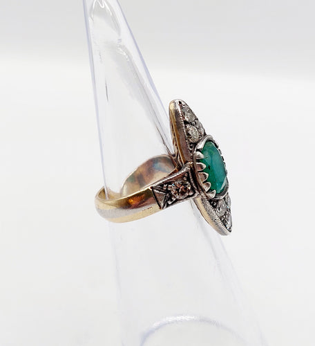 Bague 44 Bague marquise antique or jaune et platine, émeraude et diamants (circa 1920) 58 Facettes A06384