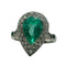 Bague Bague en platine avec une émeraude naturelle taille poire, entourée de diamants. 58 Facettes 50159