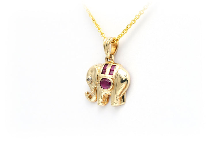 Pendentif Pendentif en or jaune serti de rubis et d'un diamant 58 Facettes B554