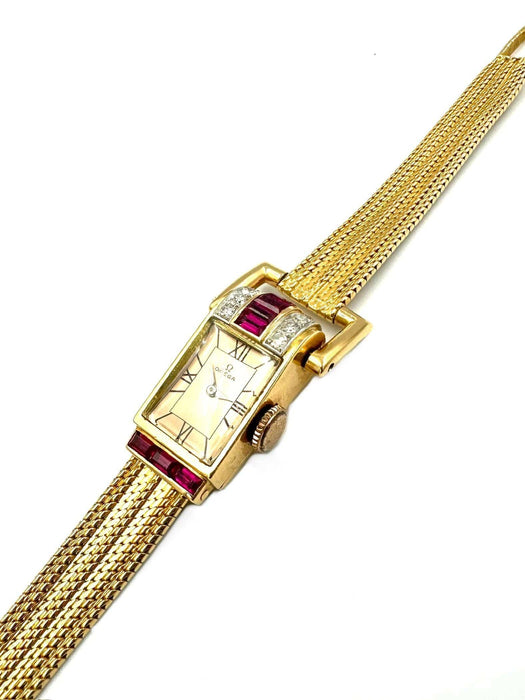 Montre OMEGA/UNIVERSAL - Montre ancienne Art-Déco en or rose, rubis et diamants 58 Facettes