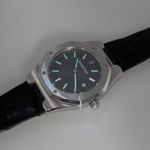 Montre AUDEMARS PIGUET - Royal Oak Date 58 Facettes