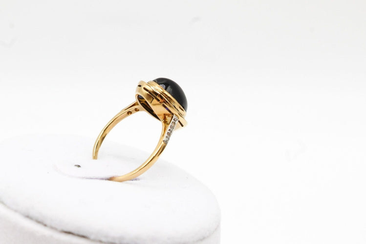 Bague Bague or jaune, platine, saphir cabochon 58 Facettes 250101