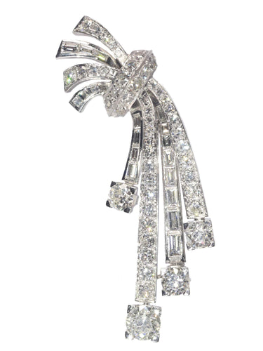 Broche Élégance intemporelle : platine et diamants des années 1950 58 Facettes 21348-0038