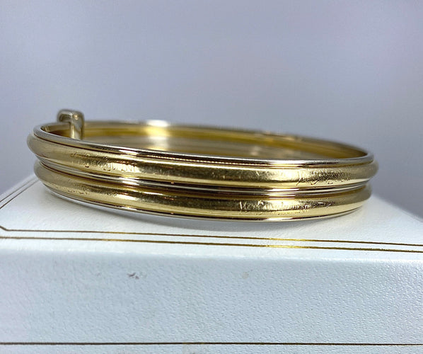 Bracelet Bracelet double joncs, or blanc, diamants, Yves Saint Laurent 58 Facettes AB601