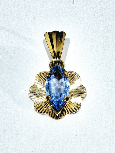 Pendentif Pendentif topaze bleue en or champagne 18 carats 58 Facettes