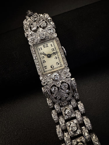 Montre montre Art Déco en platine et or blanc 58 Facettes