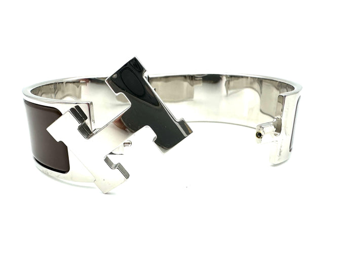 Bracelet HERMES. Collection "Clic clac H", bracelet argenté 58 Facettes