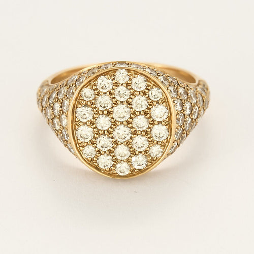 Bague 56 Bague chevalière en or rose et pavée de diamants. 58 Facettes