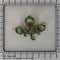 Broche Fleur de lys : broche ancienne française à l'essence verte intense 58 Facettes 23167-0365