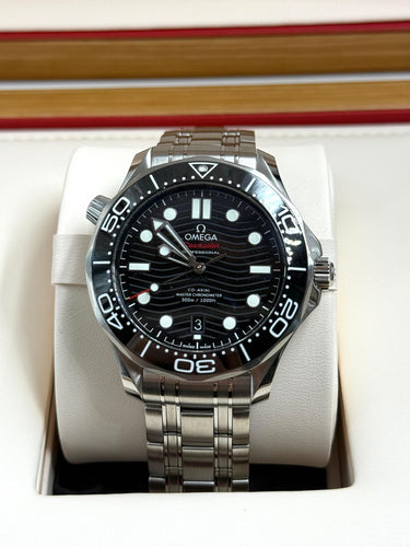 Montre OMEGA - Montre Seamaster Diver 300M 42 mm 210.30.42.20.01.001 BLACK STEEL 58 Facettes JLS