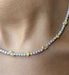 Collier Collier tennis en or blanc 18 carats avec diamants jaunes 58 Facettes G-439