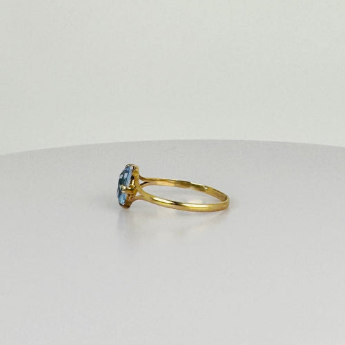 Bague Bague en or jaune avec topaze bleue ovale 58 Facettes 2508021