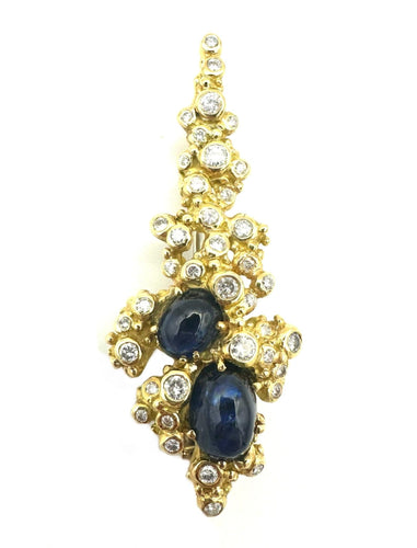 GILBERT ALBERT. Pendentif/broche or jaune, saphirs et diamants