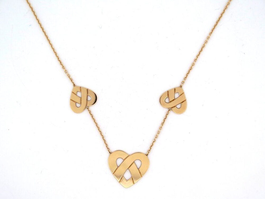 Collier collier POIRAY coeur entrelace multi 37 42cm en or jaune 18k 58 Facettes 265095