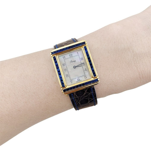 Montre Montre Poiray, "Ma Première", or jaune, nacre, saphir, cuir. 58 Facettes 35127