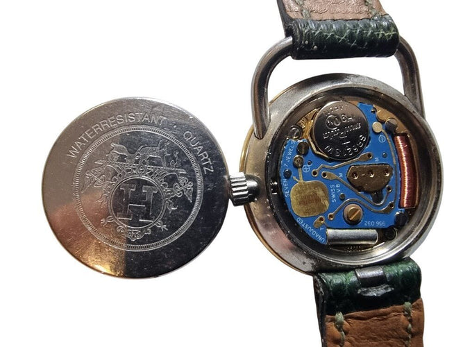 Montre vintage montre HERMES arceau plaque or 25 mm bracelet lezard quartz lady 58 Facettes 267938