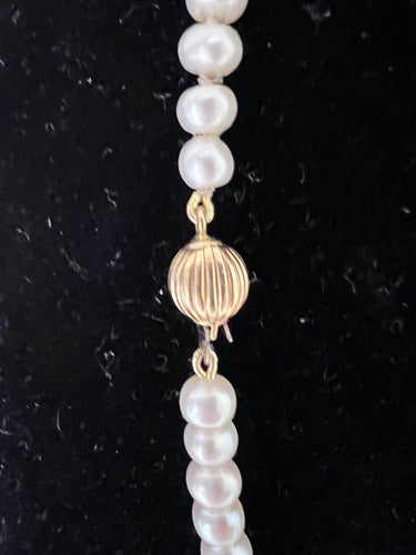 Collier Collier 107 Perles de Culture fermoir or jaune 58 Facettes