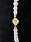 Collier Collier 107 Perles de Culture fermoir or jaune 58 Facettes