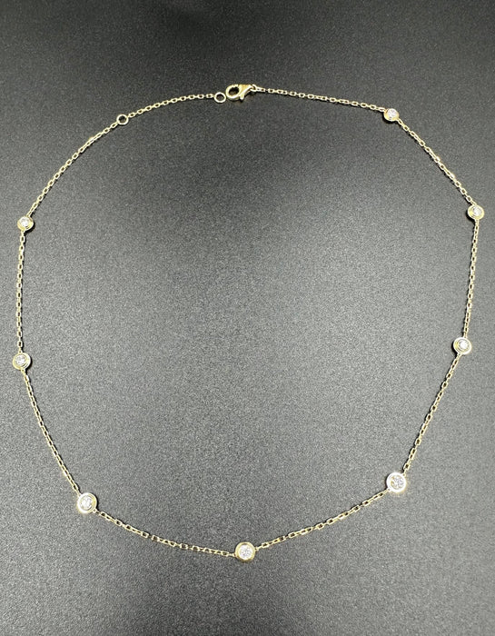 Collier CARTIER. Collection "Diamants légers", collier or jaune et diamants 0.80ct 58 Facettes