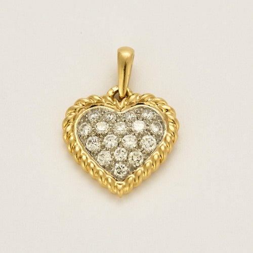 Pendentif Pendentif vintage de la maison Van Cleef & Arpels, de forme coeur en or jaune et diamants 58 Facettes MB6