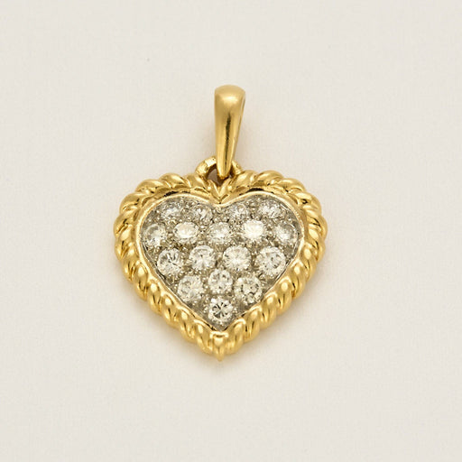 Pendentif Pendentif vintage de la maison Van Cleef & Arpels, de forme coeur en or jaune et diamants 58 Facettes MB6