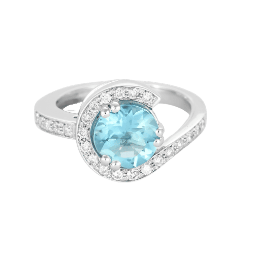 Bague 49 Bague tourbillon en or blanc, topaze et diamants 58 Facettes B250558