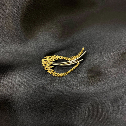 Broche Broche feuille en or et diamants 58 Facettes 330080275