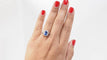 Bague 57 Bague marguerite en platine, tanzanite et diamants 58 Facettes 32520