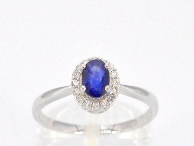 Bague 54 Bague entourage en or blanc avec diamants et saphir 58 Facettes 2010