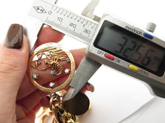 Bracelet bracelet gourmette breloques coeur zodiac t18 or jaune 18k 90.5gr charms 58 Facettes 270131