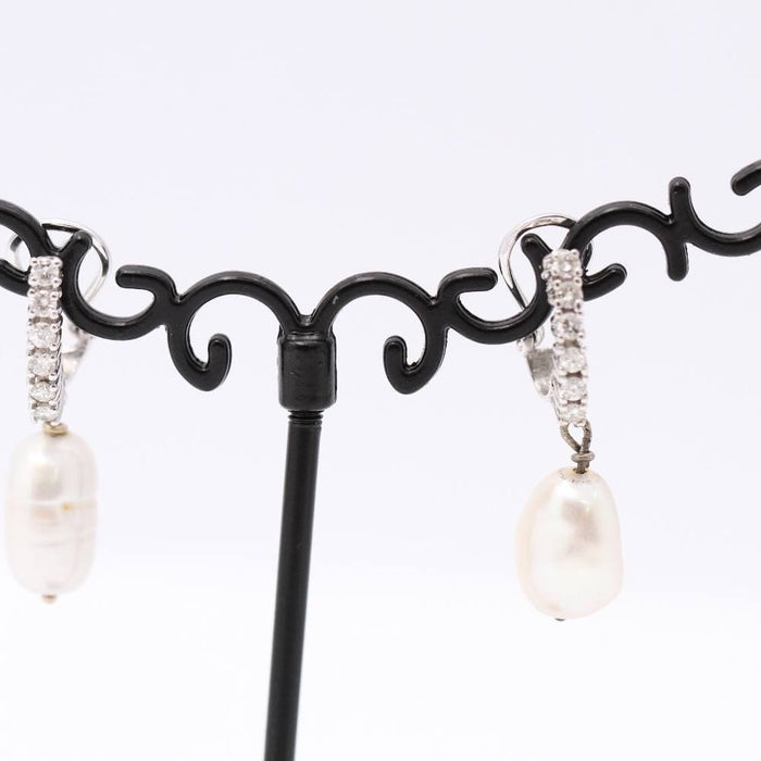 Boucles d'oreilles Boucles d'oreilles avec perles baroques et diamants 58 Facettes D359537JC