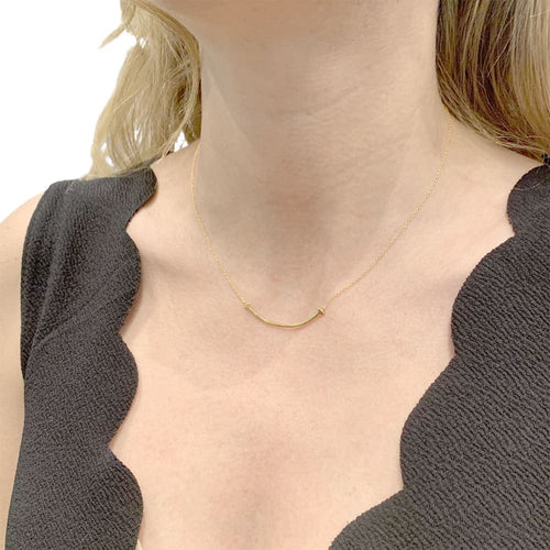 Collier Collier Tiffany & Co., "Tiffany T Smile", or jaune. 58 Facettes 35120