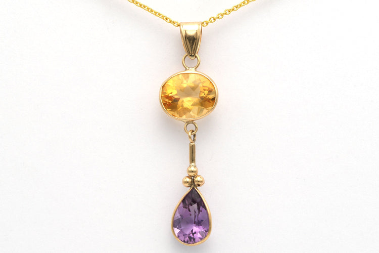 Pendentif Pendentif contemporain en or jaune, améthyste et citrine 58 Facettes 10798