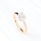 Bague en or rose sertie de diamants taille marquise et princesse