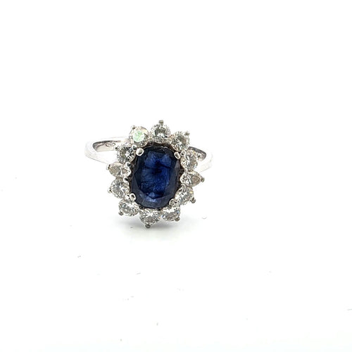 Anello en or blanc avec saphir central et diamants