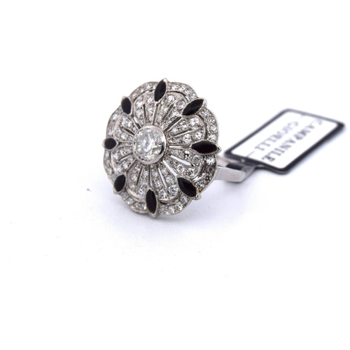 Bague Bague en or blanc ornée d'un travail ajouré spécial 58 Facettes