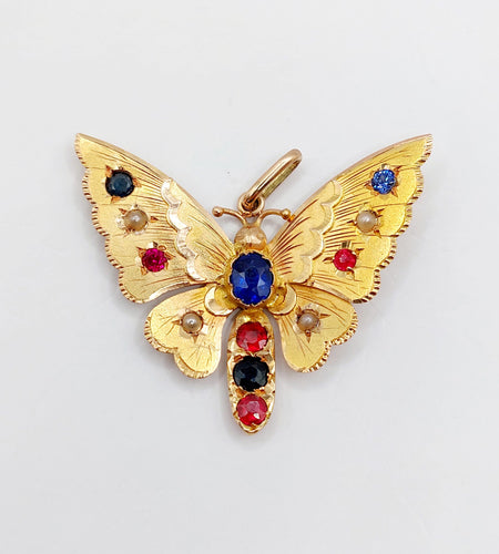 Pendentif Pendentif or rose papillon, pierres de couleur et perles 58 Facettes A05324