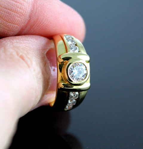 Bague 56 Bague Mixe Or jaune et Diamants (centre +/-0.55 Ct + 0.40 Ct Entourage) 58 Facettes