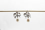 Boucles d'oreilles Boucles d'oreilles or blanc Noeuds perles et diamants 58 Facettes 5864