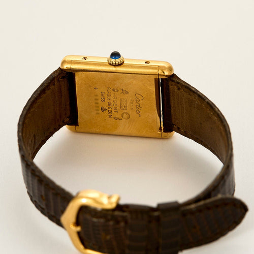 Montre CARTIER - Montre Tank Must argent plaqué or cadran laqué marron "Bois" 58 Facettes