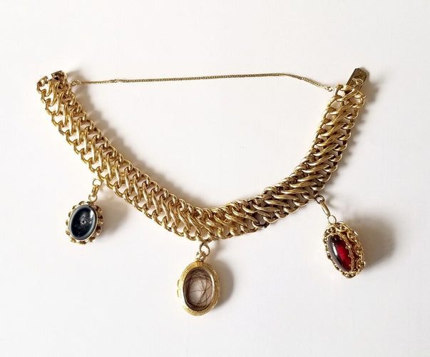 Bracelet Bracelet maille américaine or jaune 18 carats et breloques - 17 cms - 36.25 grs 58 Facettes