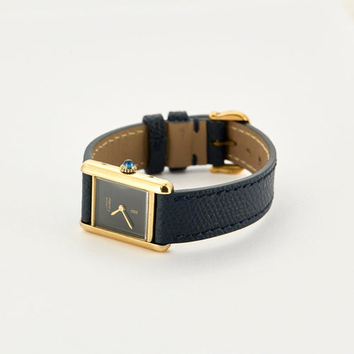 Montre CARTIER - Montre Modèle Tank Must en argent plaqué or, cadran laqué noir 58 Facettes