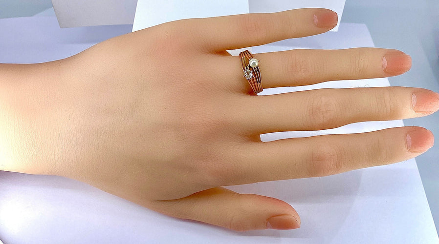 Bague toi et moi en or jaune, diamant et perle vers 1900