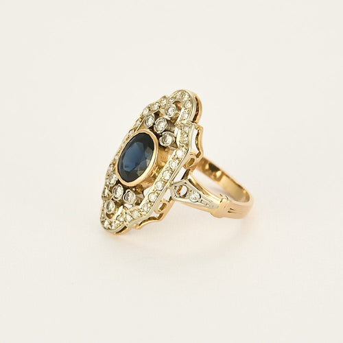 Bague 52 Bague en or jaune, or blanc, diamants et saphir 58 Facettes B240714