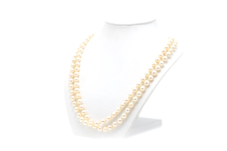 Collier Collier Années 70 en or blanc 18 carats, émeraude et perles 58 Facettes B677