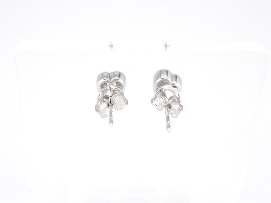 Boucles d'oreilles Boucles d'oreilles en or blanc avec un diamant taille brillant en forme de coeur 58 Facettes 2096