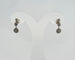 Boucles d'oreilles Boucles d’oreilles pendantes en or blanc et diamants 58 Facettes
