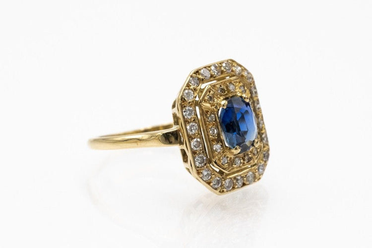 Unique yellow gold ring with an oval sapphire and diamonds 58 Facettes 11262