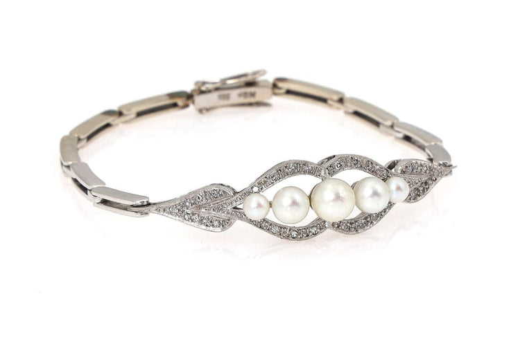 Bracelet Bracelet en or blanc avec perles et diamants 58 Facettes 10232